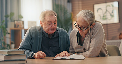 Buy stock photo Senior couple, bible and reading in home together for religious study, spiritual bonding and faith. Retirement, old people and Holy book in living room to worship God, Christian praise and scripture