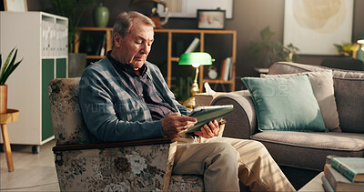 Buy stock photo Home, senior man and tablet on sofa for reading online news, retirement ebook or gambling website. Relax, elderly person or digital app in living room for web surfing, playing bingo game or streaming
