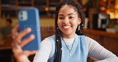 Buy stock photo African woman, selfie and happy at cafe with post on web for social network, memory and live streaming. Gen z girl, influencer and smile with photography, app and profile picture at coffee shop