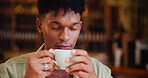 Man, coffee and smell with thinking at cafe for memory, drink or aroma with inspiration at restaurant. Person, flavor and scent with cup for reflection, remember or perspective with beverage at diner