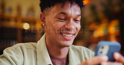 Buy stock photo Man, smartphone and texting with smile at cafe with contact, typing and streaming on web at restaurant. Person, phone and laugh with meme, search and check post with social media at coffee shop
