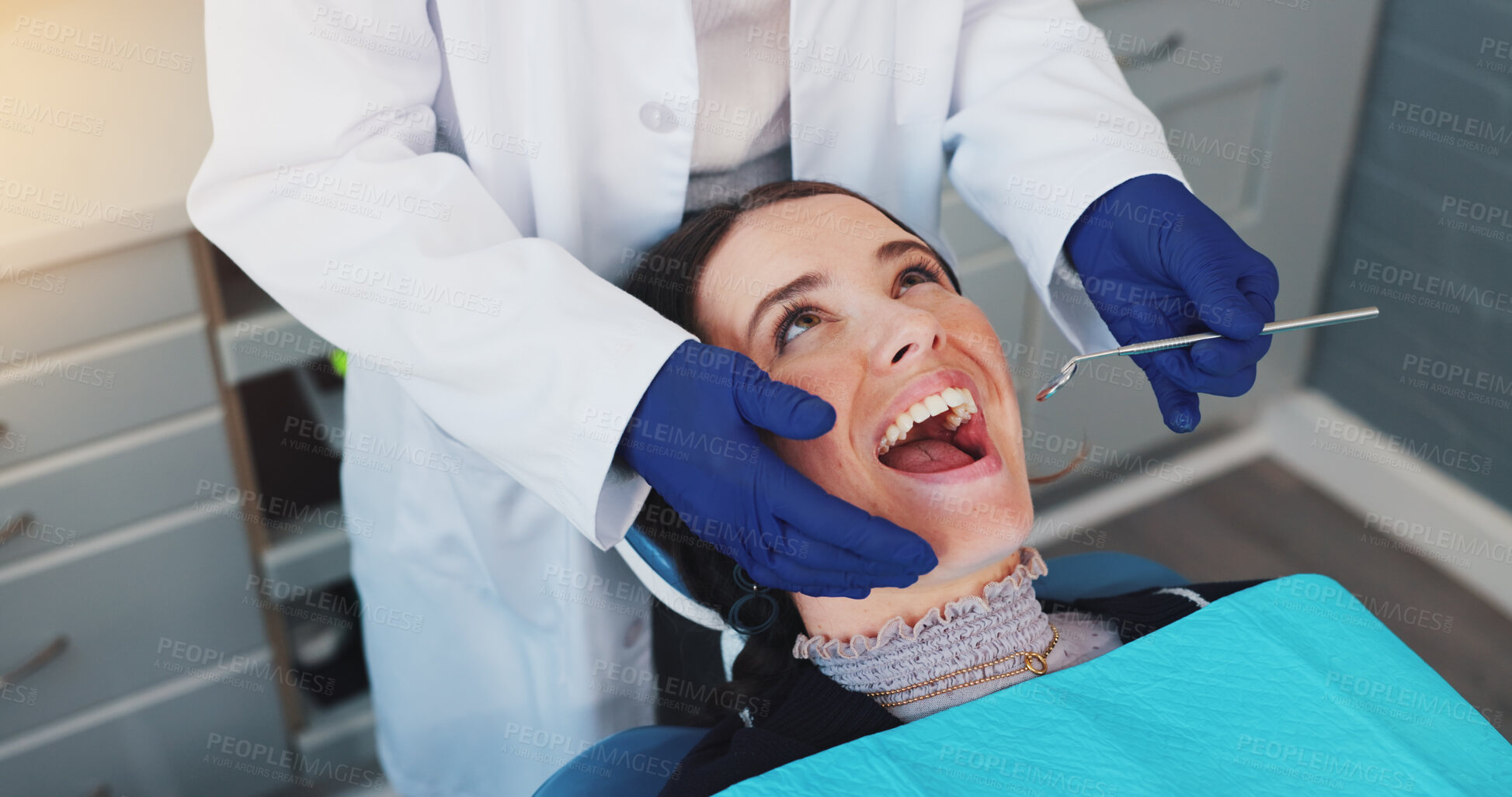 Buy stock photo Dental mirror, checkup and dentist with woman for treatment of tooth decay, cavity or oral care. Consultation, health and orthodontist with female patient for procedure with medical tool in clinic.