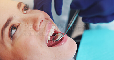 Buy stock photo Dental mirror, oral care and dentist with woman for treatment of tooth decay, cavity or consultation. Checkup, health and orthodontist with female patient for procedure with medical tool in clinic.