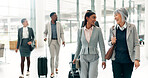 Business travel, colleagues and people with luggage, airport or team on international trip for case. Group, talk and collaboration for trial, abroad and commuting with suitcase, attorney and walk