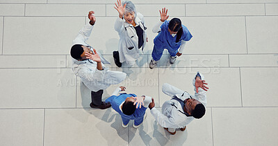 Buy stock photo Above, cheering and doctors in hospital, healthcare or celebration with support. People, group or medical service with wellness, excited or clinical trial success with results or funding for research