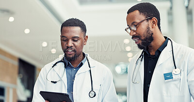 Buy stock photo Men, doctor or research with tablet for medical discovery, innovation or statistics at hospital. Male people, employees or healthcare workers on technology for telehealth app or information at clinic
