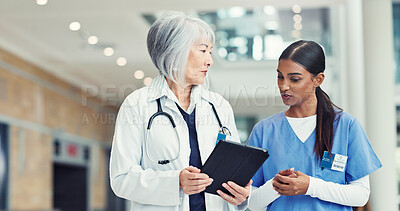 Buy stock photo Women, nurse or doctor with tablet for research discussion or healthcare mentorship at hospital. Female people, intern or medical worker with technology for staff training on telehealth app at clinic