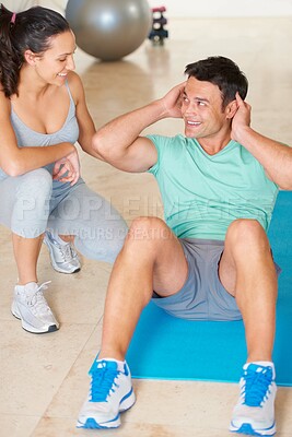 Buy stock photo Couple, fitness and man sit up in exercise and workout for health, wellness and cardio together, People, training or woman helping person with core, crunches and pilates routine in gym with happiness