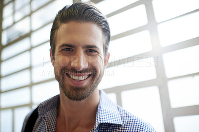 Buy stock photo Portrait, confident and man with smile, office and excited for new job in newsroom, journalist and happy. Ambitious, reporter and person with pride for career path, creative and employee in Canada