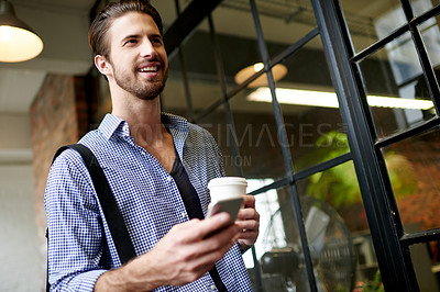 Buy stock photo Office, coffee and man with smartphone, thinking and smile for career growth in newsroom and morning. Business, journalist and person with mobile for research, tea break and employee with caffeine