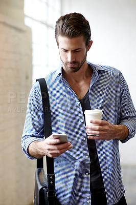Buy stock photo Business man, coffee and phone for communication of creative career, contact or network. Male entrepreneur, break and beverage while reading email, social media and message or consulting on internet