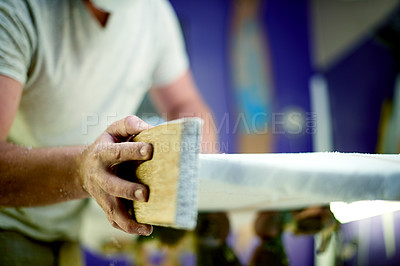 Buy stock photo Man, hands and sanding surfboard in workshop for craft, inspection or quality control. Hobby, surfer or tools in studio for maintenance, equipment shaping and entrepreneur with small business service
