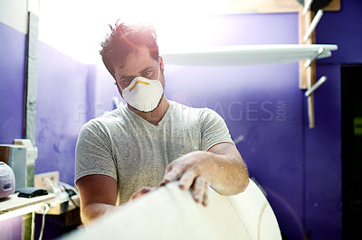 Buy stock photo Man, factory and manufacturing with surfboard, design or career for water sports equipment in mask for safety. Person, process and ppe gear for dust, inspection and quality assurance at surf workshop