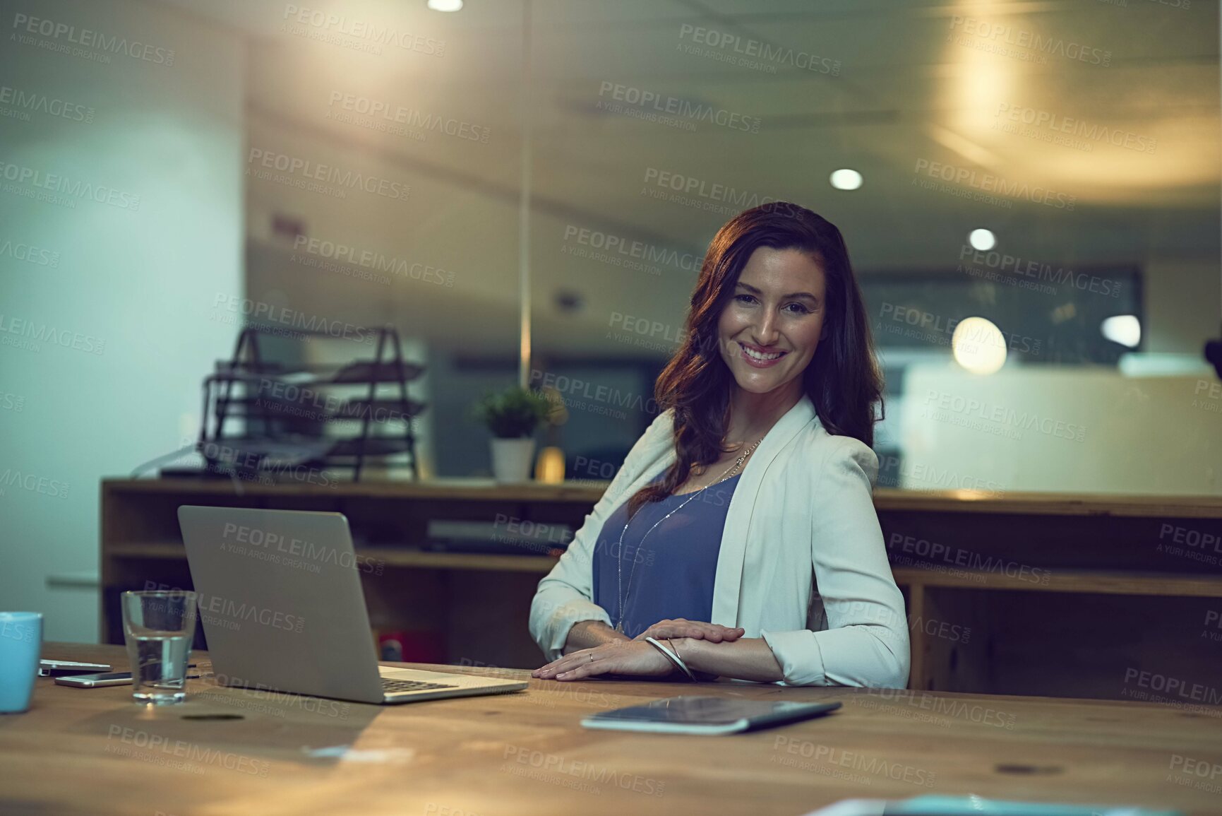 Buy stock photo Portrait, night and business with woman, laptop and smile with human resources, confidence or career ambition. Face, evening or compliance officer with computer, internet or professional with startup