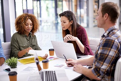 Buy stock photo Office, brainstorming and business people in meeting, planning and cooperation with laptop, documents and speaking. Design agency, staff or group with technology, paperwork and collaboration for idea