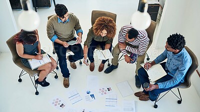 Buy stock photo Shot of a group of colleagues having a meeting in a modern office