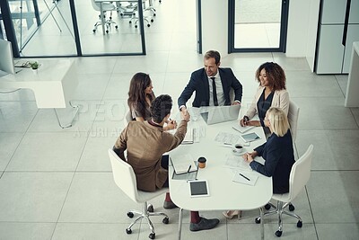 Buy stock photo Above, handshake and business people in office, thank you and cooperation for project. Employees, shaking hands and group in workplace, gesture or collaboration with partnership, onboarding or deal