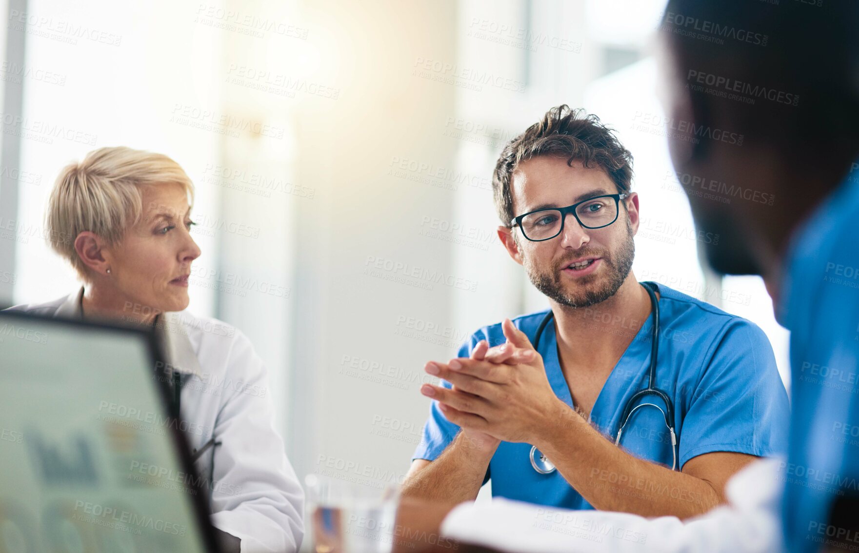 Buy stock photo Hospital, group and doctors in meeting, healthcare and conversation for surgery schedule, teamwork and research. Review, medical and professional with communication, feedback and wellness in clinic