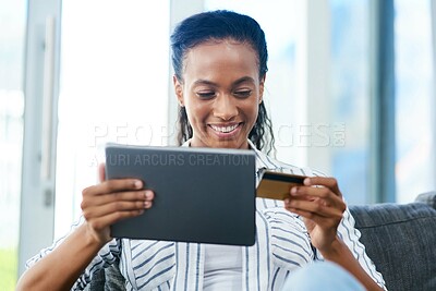 Buy stock photo Smile, laptop and African woman with credit card on sofa for transaction, e commerce or online shopping in living room. Payment, app and person for purchase, subscription or internet banking in home