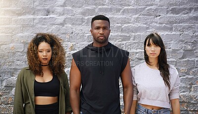 Buy stock photo Friends, portrait and fashion with confidence on brick wall in outdoor for casual, style and elegant. Diversity, group and inclusion with clothes or street wear, outfit and satisfied together

