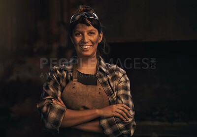 Buy stock photo Woman blacksmith, portrait and smile in workshop, industrial warehouse or trade with entrepreneurship. Small business owner, female entrepreneur or confident in factory, industry or metalwork artisan