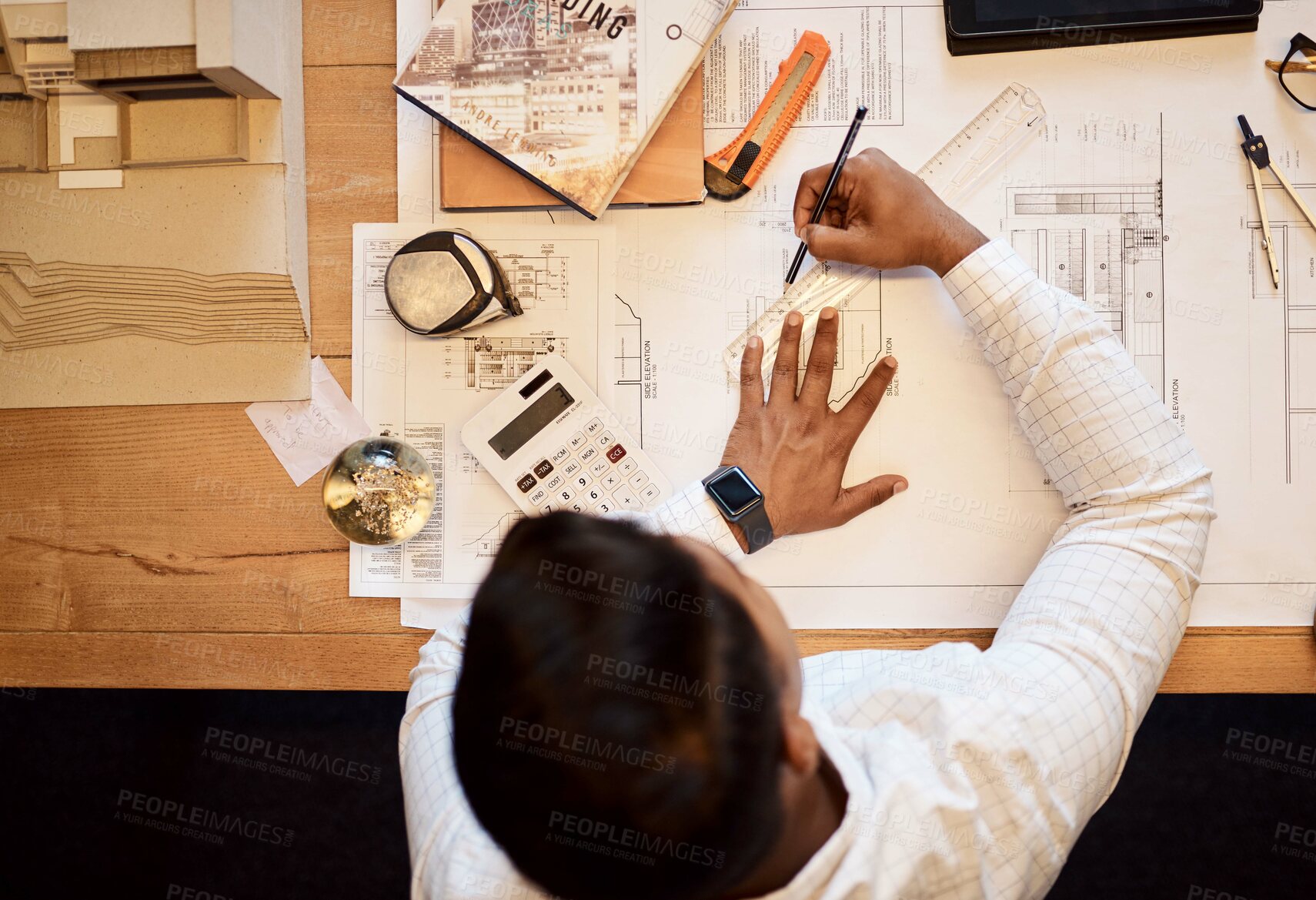 Buy stock photo Man, architect and drawing on document in office of architecture design, floor plan and project sketch. Above, person and blueprint for illustration update, property remodeling and renovation process