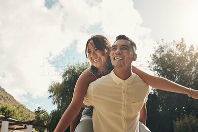 Buy stock photo Happiness, couple and piggyback in garden for love, summer and having fun together outdoors. Relationship, smile and partnership on weekend for support, trust and sunshine in springtime for joy