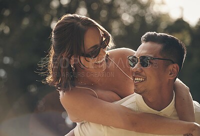 Buy stock photo Happy, couple and piggyback with love on date in garden, park or adventure on holiday or vacation. People, play and relax in backyard with fun journey, game or partner support woman with ride on back