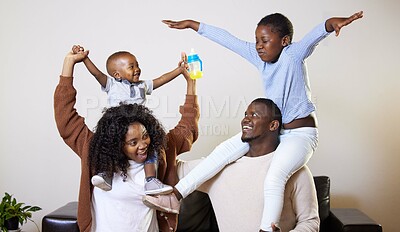 Buy stock photo Black family, home and playing with smile, airplane and love with happiness. Mother, father and children with sofa, lounge and game for fun and joy with kids for childhood memories in living room