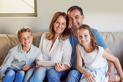 Buy stock photo Smile, sofa and portrait of family with tablet in living room for communication, streaming and movie. Mother, father and children with tech at home for bonding, childhood development and online film