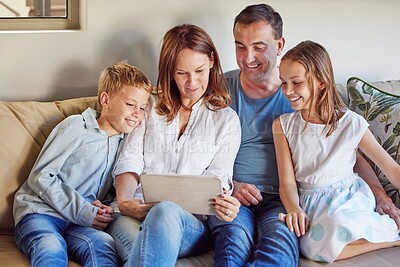 Buy stock photo Home, movie and family with tablet on sofa for online search, digital streaming and network. Father, mother and kids with technology in house for bonding, childhood development and film subscription