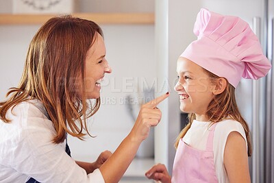 Buy stock photo Mother, girl and flour for nose touch or baking in kitchen, support and learning to prepare cookies.  Daughter, mama and pastry education in home, love and bonding while cooking snacks or dessert
