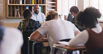Buy stock photo Teenagers, test and exam with writing, study and support for education and knowledge. Man, students and classroom with learning, teacher and high school development for future growth for question
