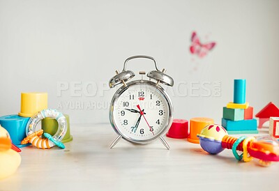 Buy stock photo Baby toys, nursery and background with clock for childcare, learning and motor skills in family home. Care, progress and growth for education as curious, playful and development in safety or security