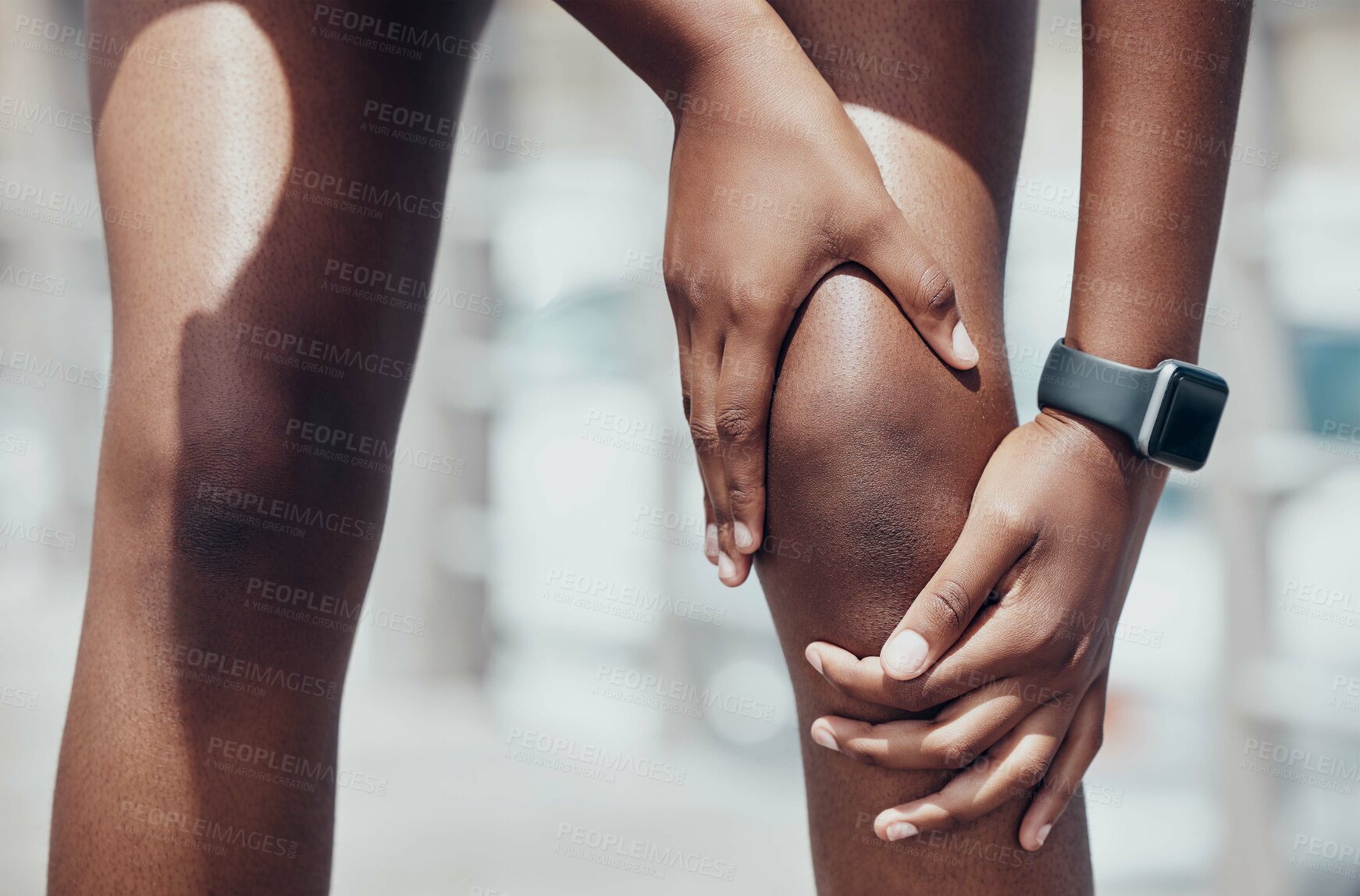 Buy stock photo Knee injury, pain and woman athlete touch painful strain while training, running and doing workout. Exercise watch, female and lady runner massage leg cramp, suffering and aching joints doing fitness