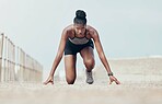Fitness, runner and woman start running workout along beach, cardio and speed training. Sports, exercise and portrait of black woman prepare for marathon with morning run, serious, focus and intense