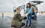Family, beach and mom and child hold hands on road trip bonding travel vacation summer break. Smiling mother, love and happy young girl freedom together in nature by the ocean on holiday
