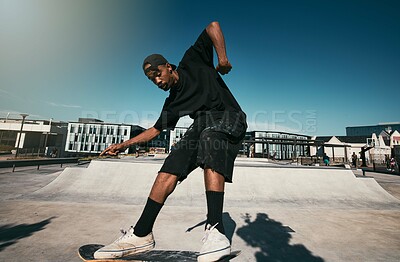 Buy stock photo Black man, skater on skateboard and skate trick in a park in  Los Angeles California summer sun for fitness, exercise and fun. Extreme sports athlete, cardio workout and skating competition training 