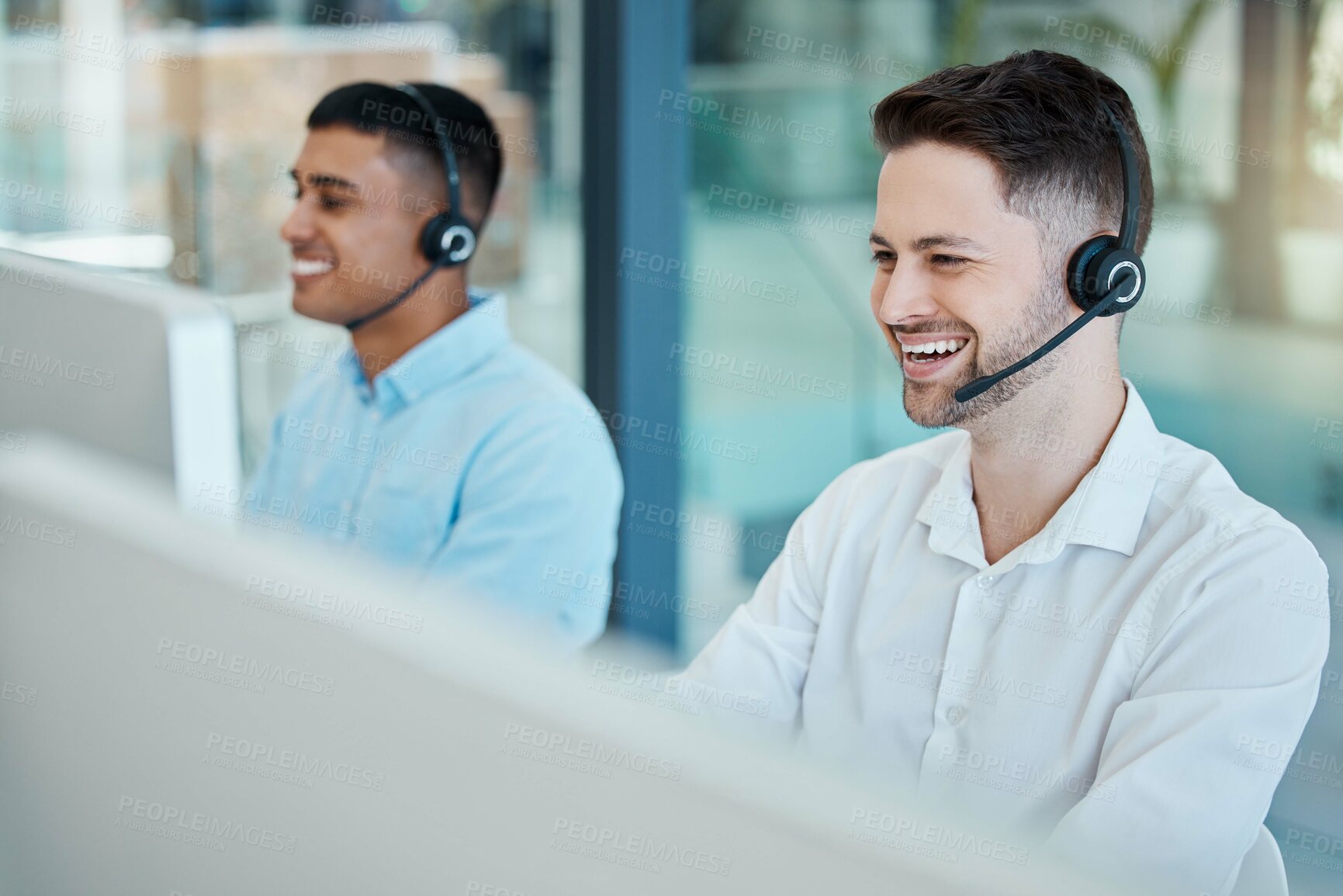 Buy stock photo Happy call center, consultant man laugh on customer service phone call and happiness in office. Customer support team, working smile for crm teamwork and sitting at telemarketing computer for help