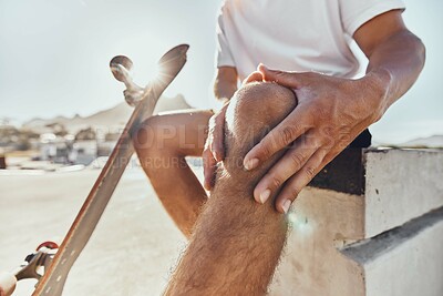 Buy stock photo Knee pain, injury and skate accident in a skating park with training, fitness and hands holding leg. City sports, urban and skateboard exercise with board during a workout and legs muscle wound