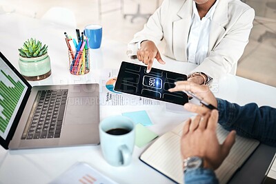 Buy stock photo Business people, hands and tablet with icons for marketing, analytics or SEO at the office. Group working on technology display for online research, teamwork or planning strategy at workplace