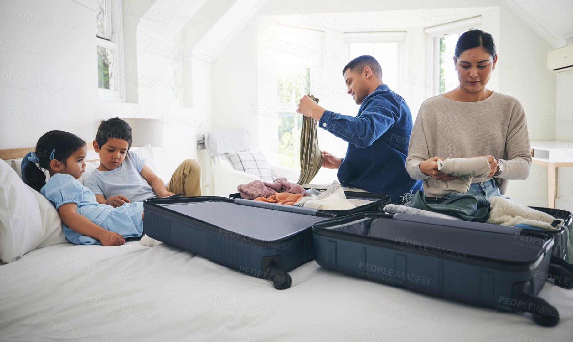 Buy stock photo Travel, luggage and home with family and holiday suitcase with mom, dad and children. House, bag and helping in a bedroom for vacation and journey with mother, father and kids together by bed
