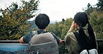 Outdoor, couple and bridge with nature for hiking, sightseeing or adventure in Japan. Relationship, people and back view with exploring on trip, travel and holiday in countryside on break for bonding