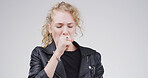 Girl, coughing in studio and sick with health problem, lung disease or tuberculosis. Hand, pneumonia or respiratory virus with female person and allergic reaction by space on white background