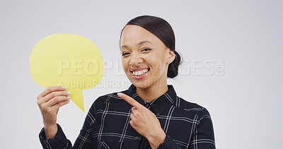 Buy stock photo Speech bubble, pointing and woman in studio for announcement, opinion or voice for social media. Happy, mockup space and female person with text board, blank sign or placard vote by white background.