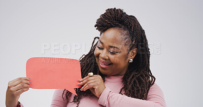 Buy stock photo Happy, speech bubble and black woman in studio, feedback and communication on white background. Smile, African person and model with poster, paper or opinion with voice review or information sign