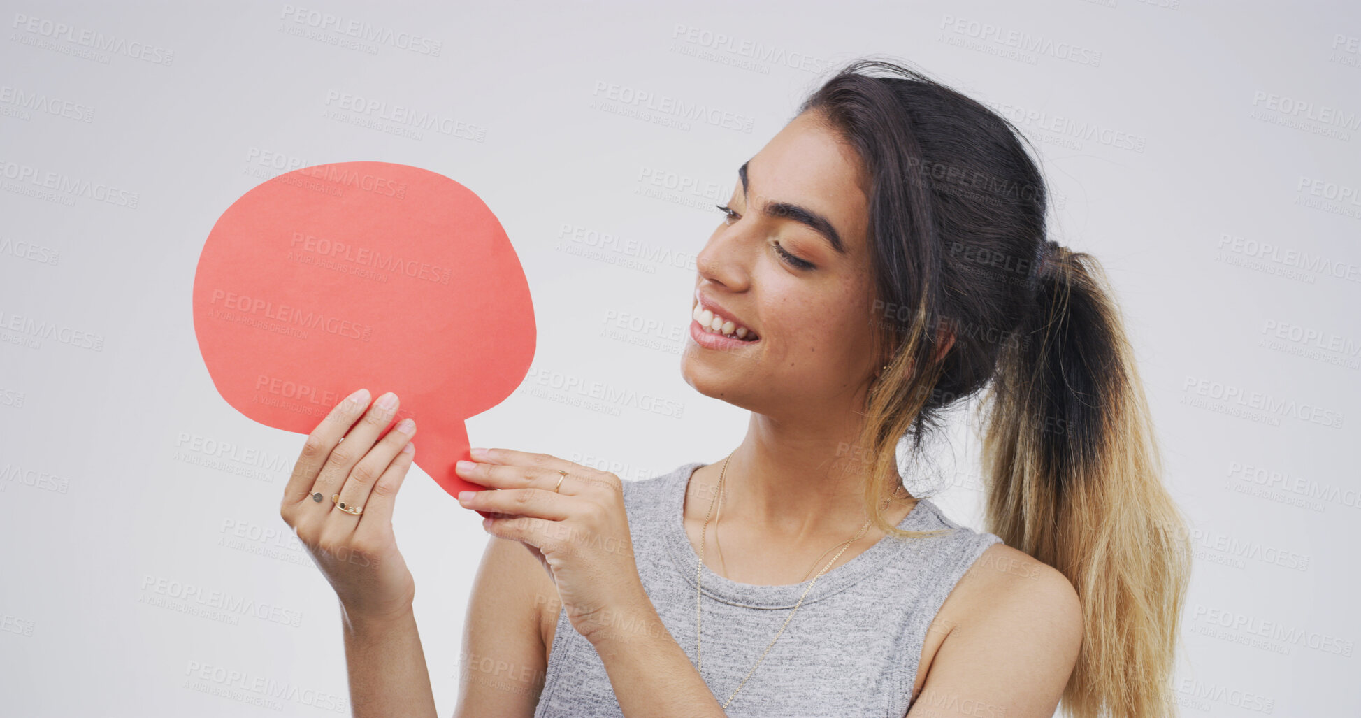 Buy stock photo Speech bubble, mockup space and woman in studio for announcement, opinion or voice for social media. Happy, review and female person with text board, blank sign or placard vote by white background.