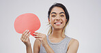 Portrait, happy woman and speech bubble with sign for voice, language and idea. Smile, person and dialogue balloon for opinion, feedback and translation on white studio background with mockup space