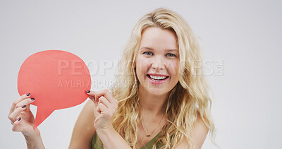 Buy stock photo Happy woman, speech bubble and smile in studio, portrait and mock up space on white background. Person, excited and blank poster for feedback, announcement and choice with social media in Germany
