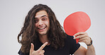 Speech bubble, pointing and portrait of man in studio with feedback, announcement or vote. Social media, mockup space and person from Portugal with text box, blank sign or placard by white background